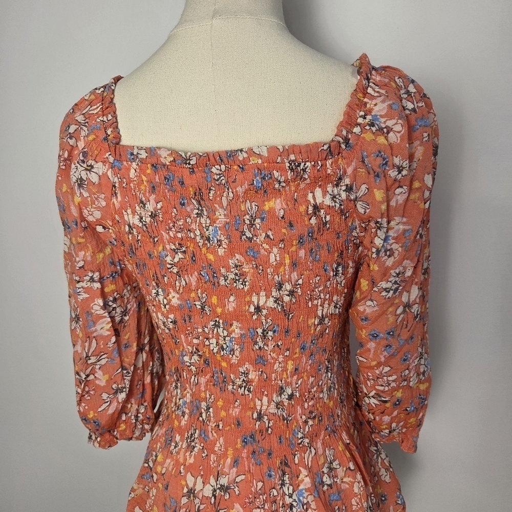 Nanette Lepore Floral Ruffled Smocked Peplum Blouse - Picture 9 of 12